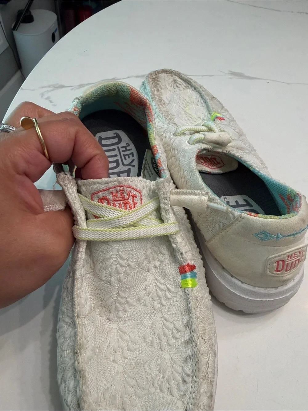 Hey Dude women’s White Slip-On Moccasins with Pastel Rainbow Details